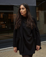 Vestido Macarena negro – Roots VISS Madrid, corte recto